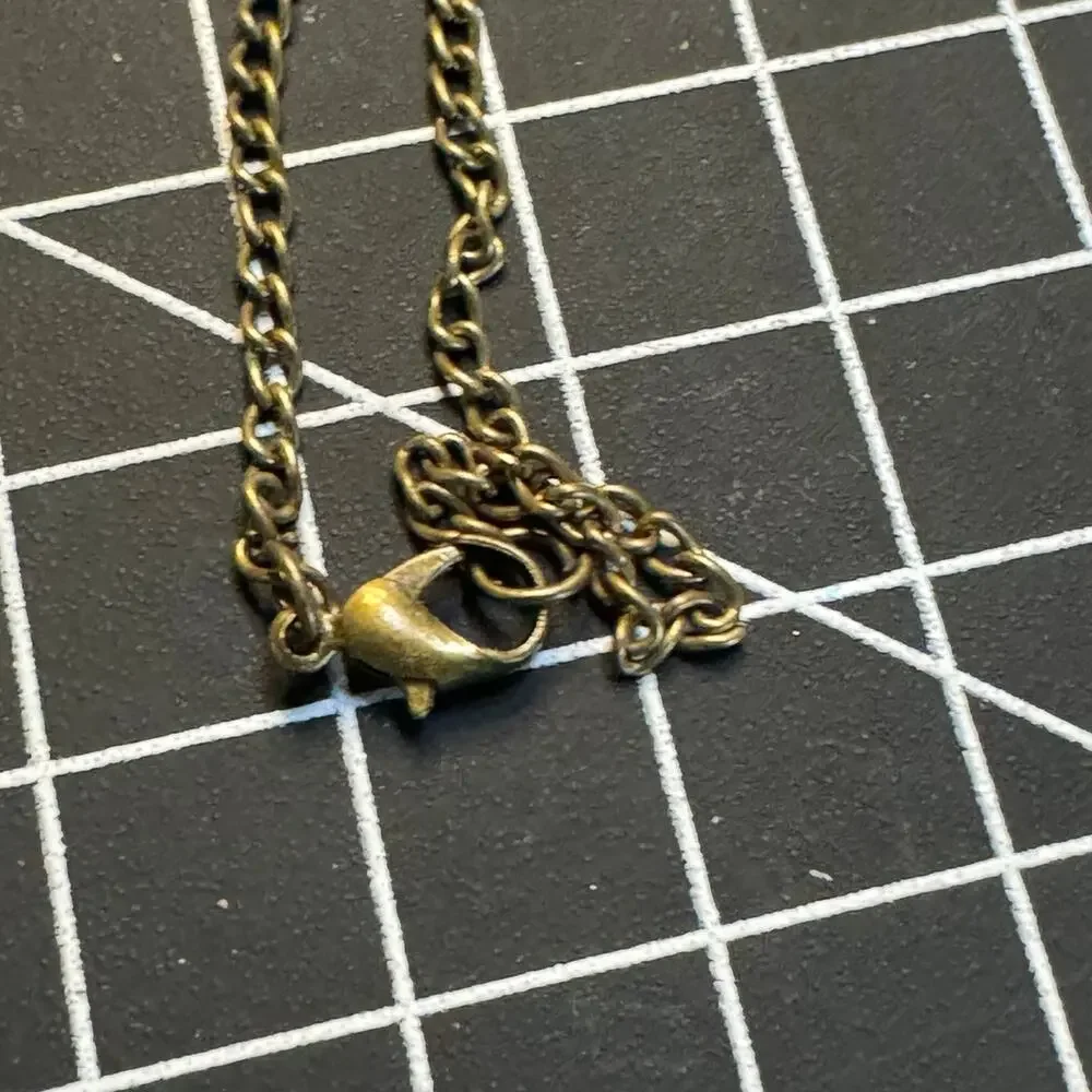Silver Tone Skull Pendant Necklace Rhinestone Accent Gold Chain Goth Emo Punk